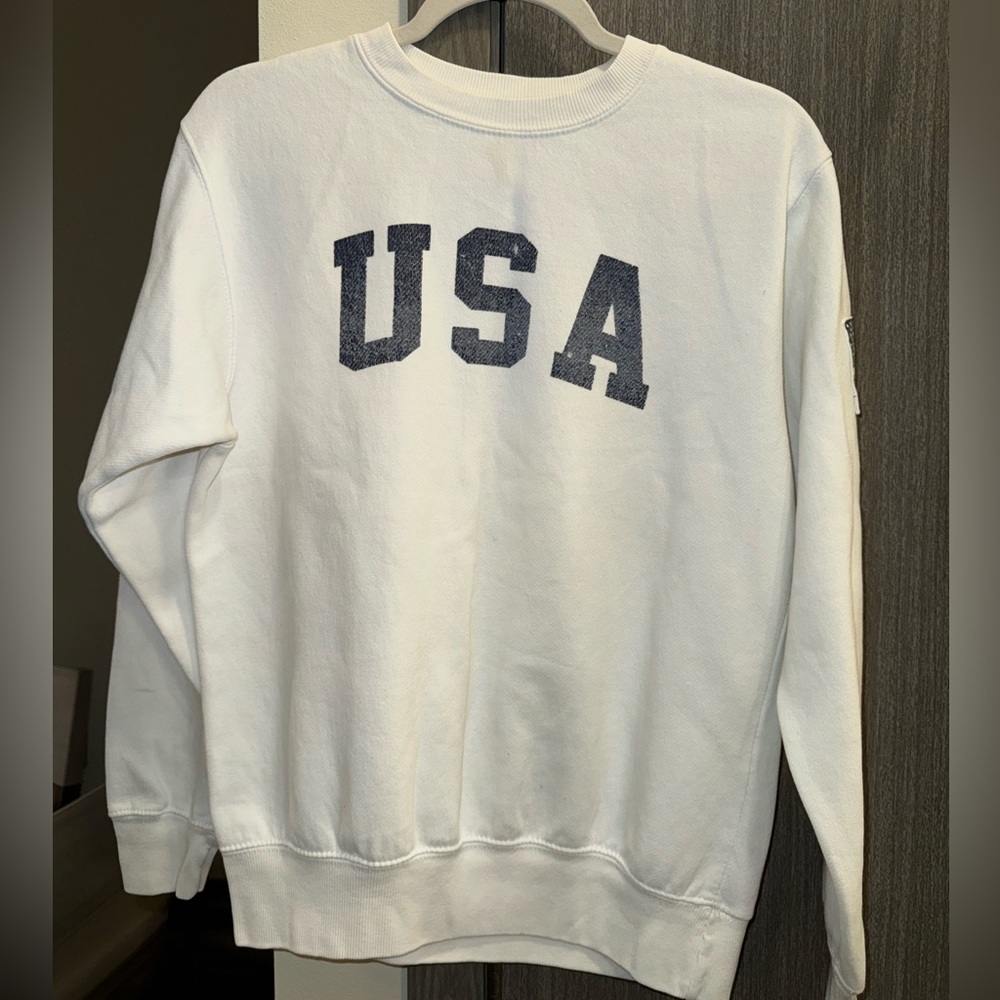 White USA sweater.